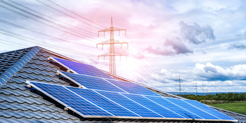Solar,Panels,And,Electrical,Transmission,Towers